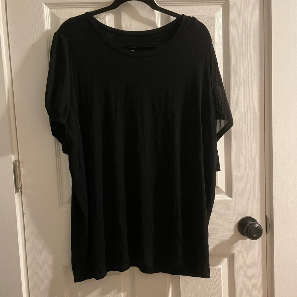 Black top with sheer sleeves